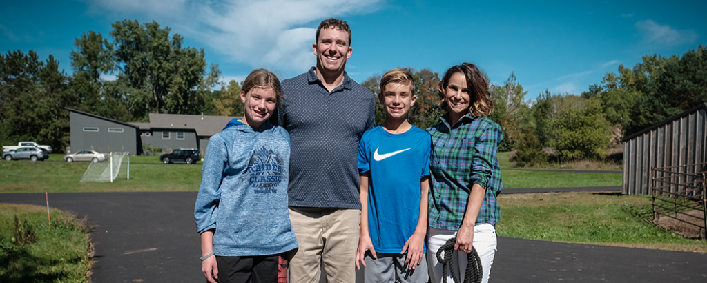 The Dillingham Family outside at home