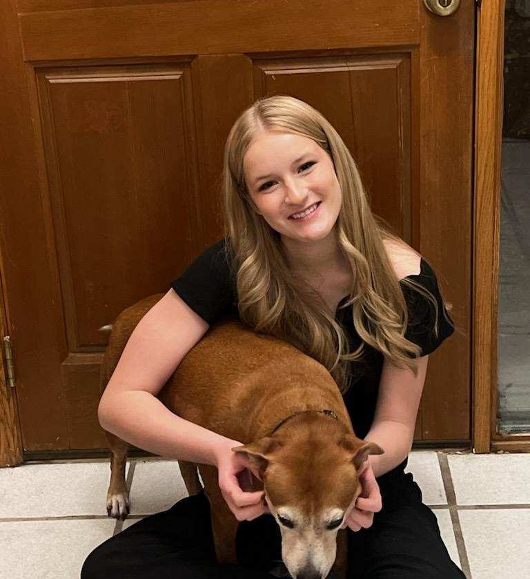 Briella with a dog