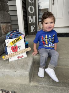 Colton poses for a photo on his first day of preschool