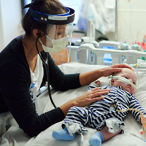 Children's Minnesota doctor helping heart patient