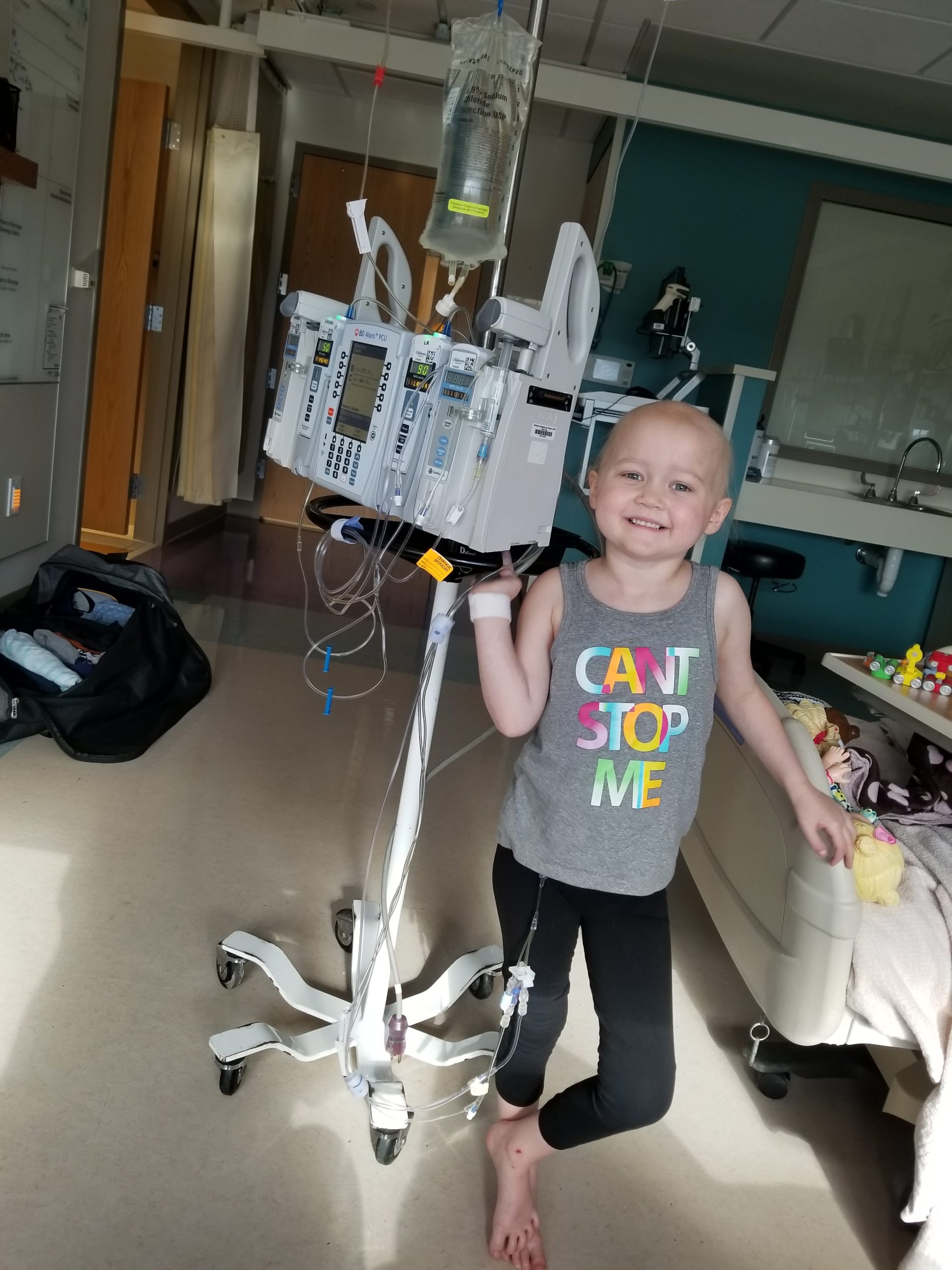 Kendall in her hospital room wearing a shirt that says "Can't stop me"