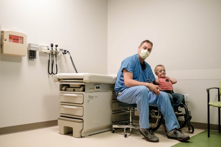 Provider with patient in clinic room