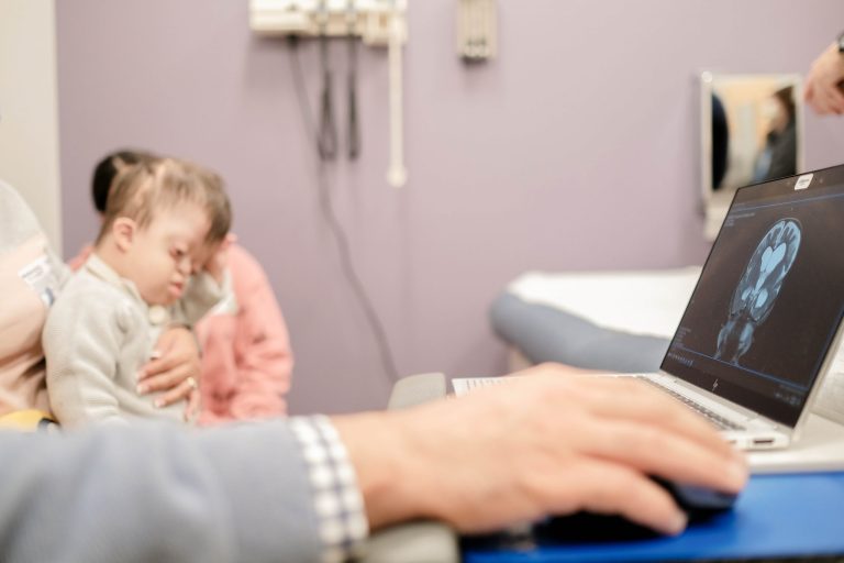 Close up image of patient family talking with a provider