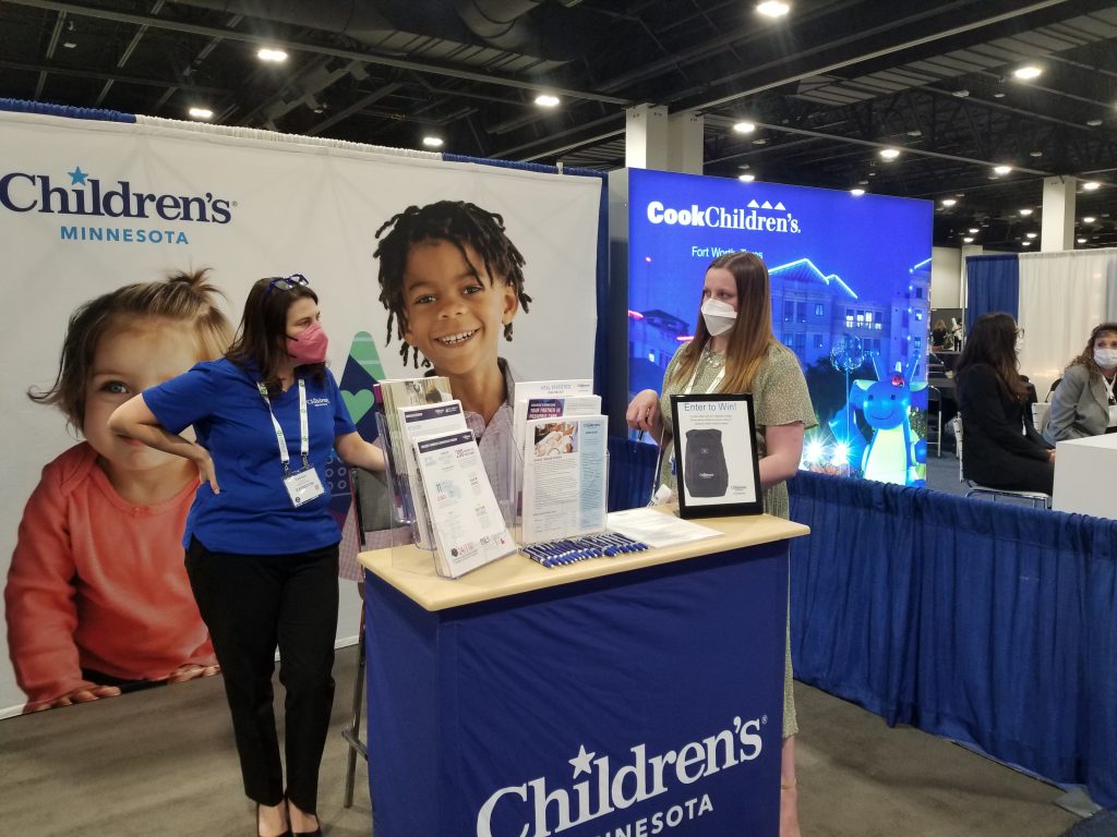 Children's Minnesota staff at our booth in the exhibit hall