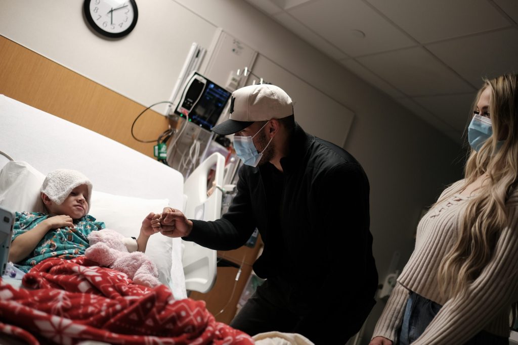 Carlos Correa visiting a Children's Minnesota patient at the bedside