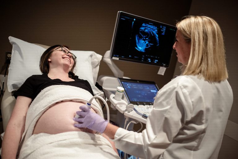 Cardiologists checking on baby's heart.