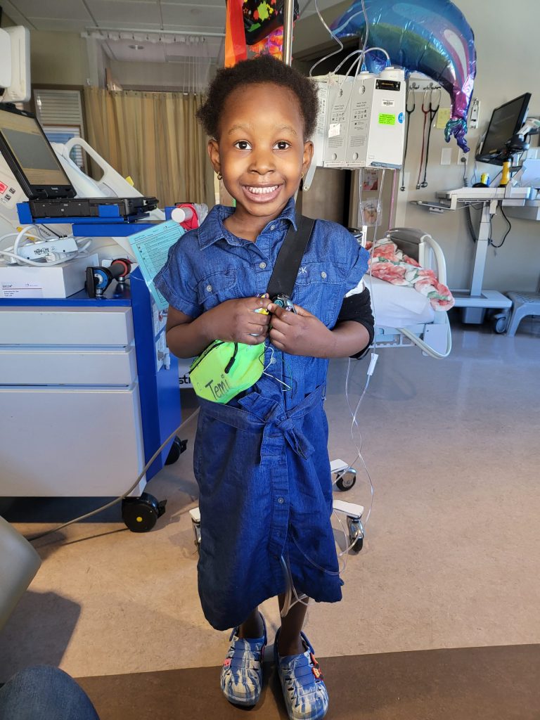 Temi smiling.