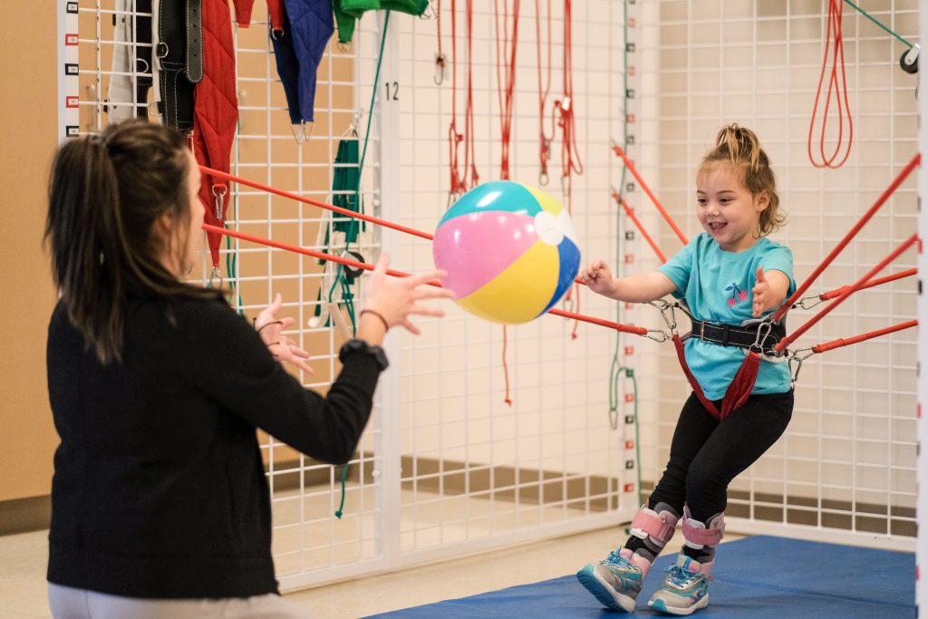 Chloe during rehab playing with a ball