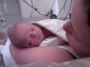 Meghan holding baby June