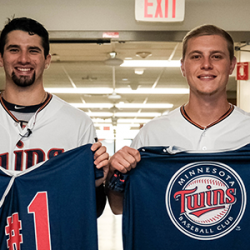 Minnesota Twins players with hospital gowns