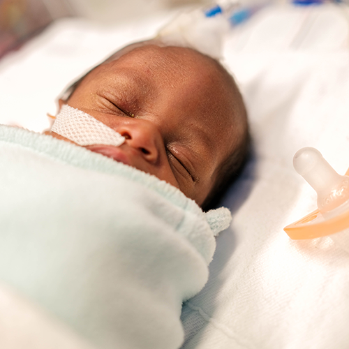 a newborn baby is sleeping