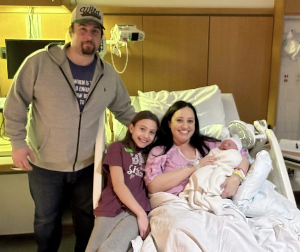The Strohm family in the hospital after Diana was born