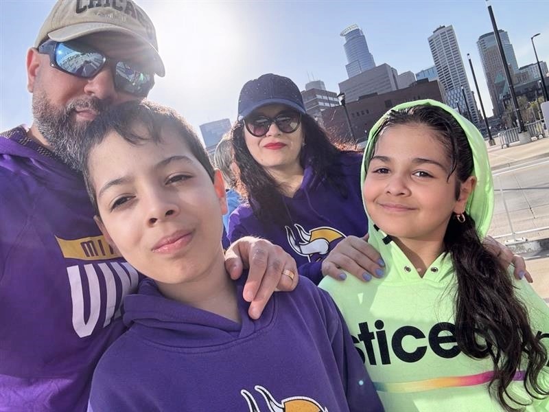 Alex and his family at a Vikings game