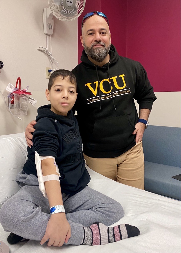 Alex and his dad at Children's Minnesota