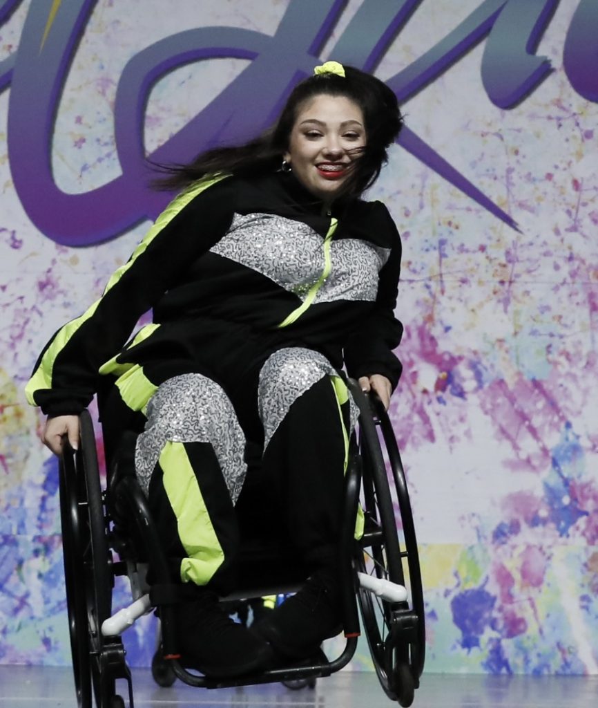 Kaili dancing at the Rollettes