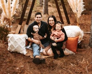 Baby Jagger and his family sitting