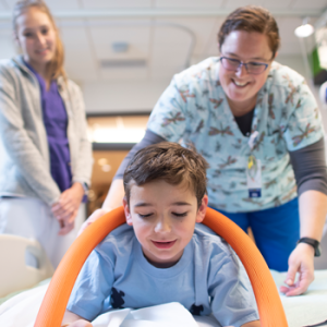 child with nurses