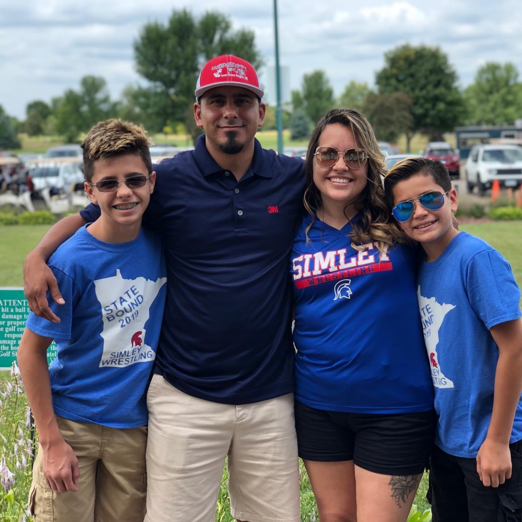 Brandi Salas with family at a baseball game