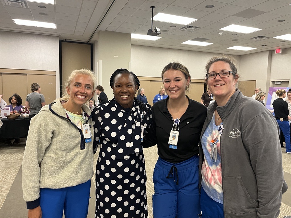 Caroline with Children's Minnesota nurses