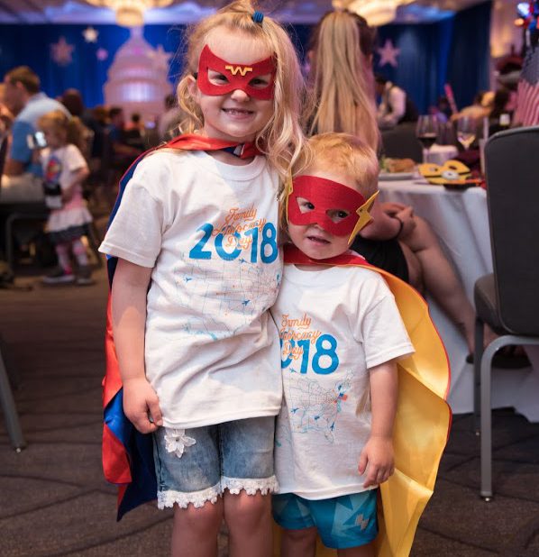 Charlie and Mya at a party at the Family Advocacy Day event