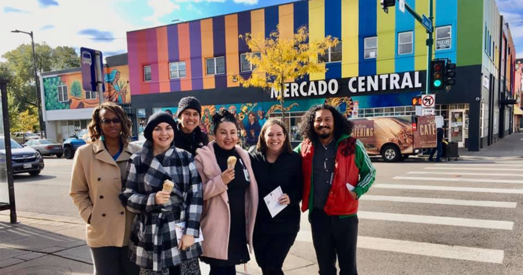 Group of Children's Minnesota employees outside of Mercado Central on a bridging walk