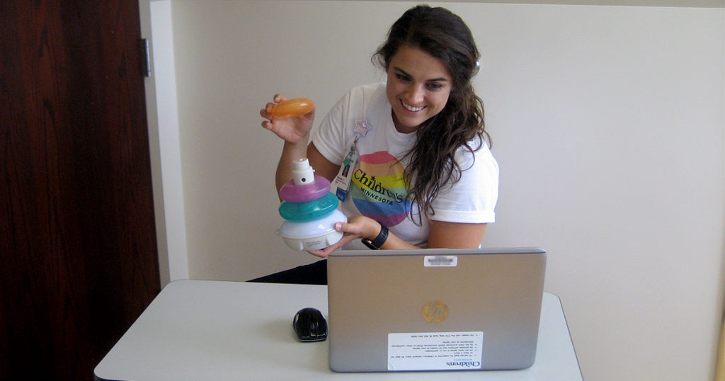 Courtney Cahow, occupational therapist at Children’s Minnesota Maple Grove rehab clinic, doing a virtual care appointment
