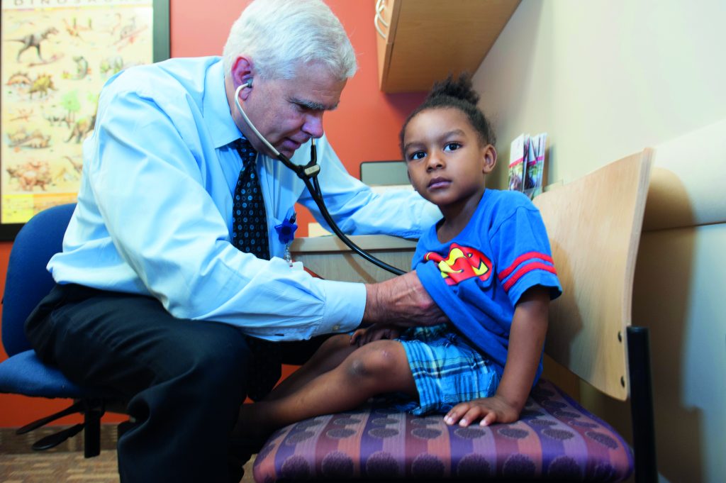child getting a check up for a heart condition|