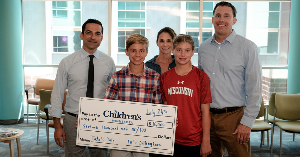 Dillingham family presenting $16,000 check to Children's Minnesota.