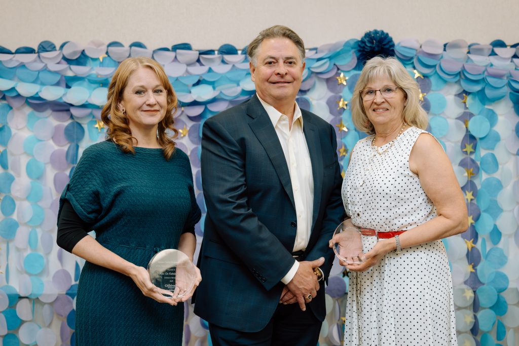 Kris Catrine, MD, with Mike and Shelly Hanson at the ceremony celebrating the endowed chair.