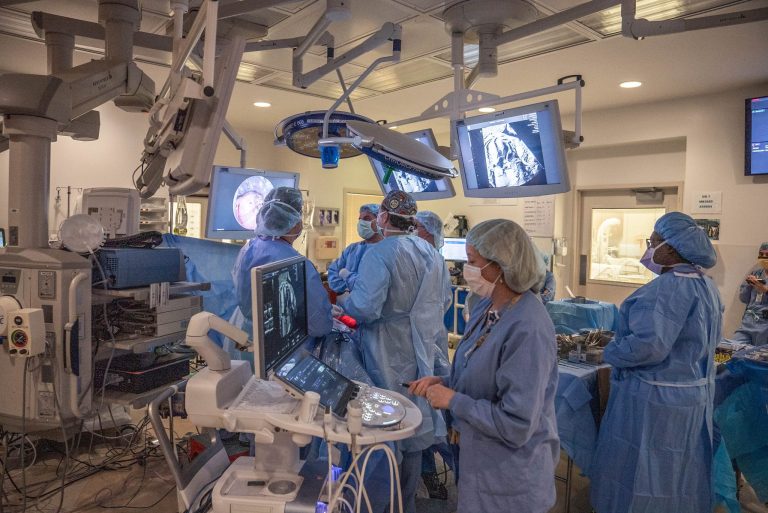 Santiago's care team in operating room.