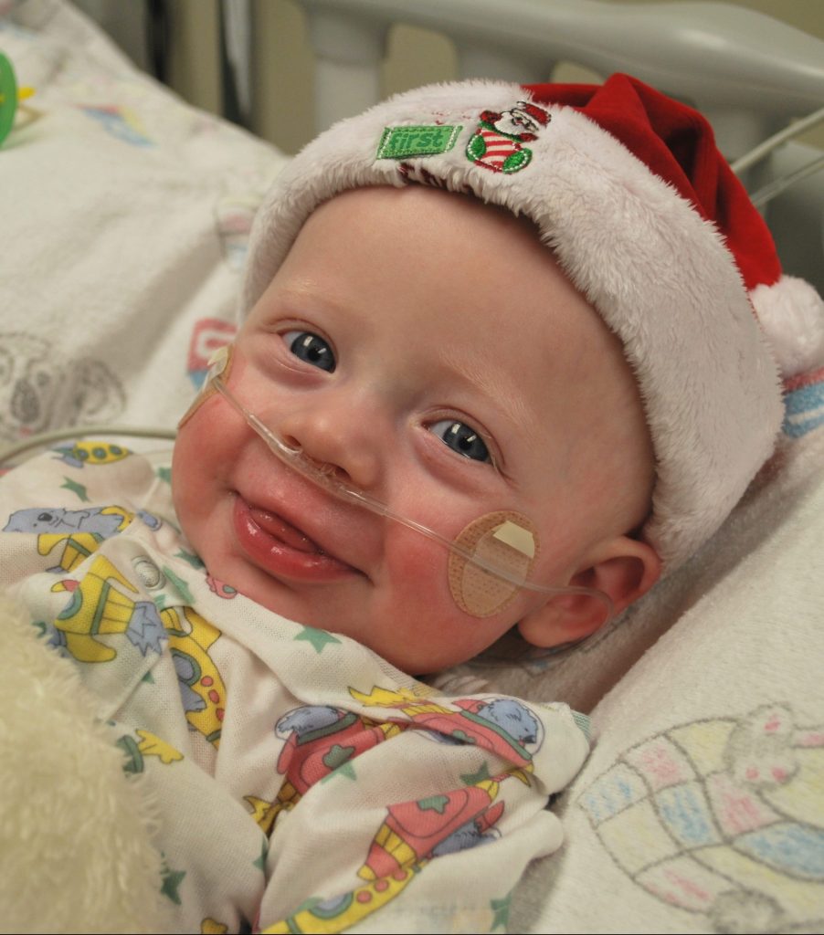 Evan as a baby in the hospital