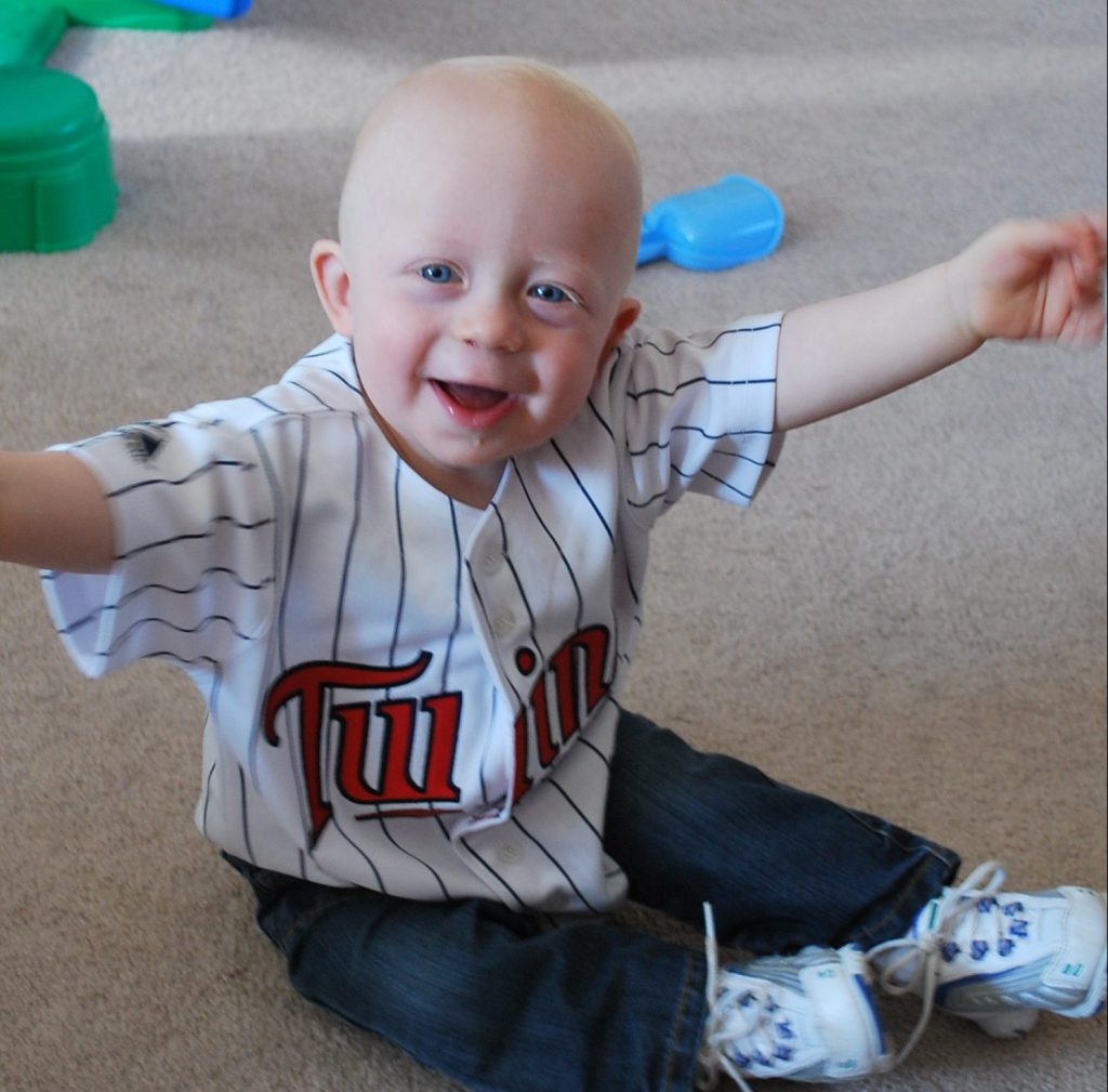 Evan at home in a Twins jersey