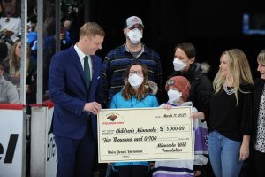 Jack joins check presentation to Children's Minnesota