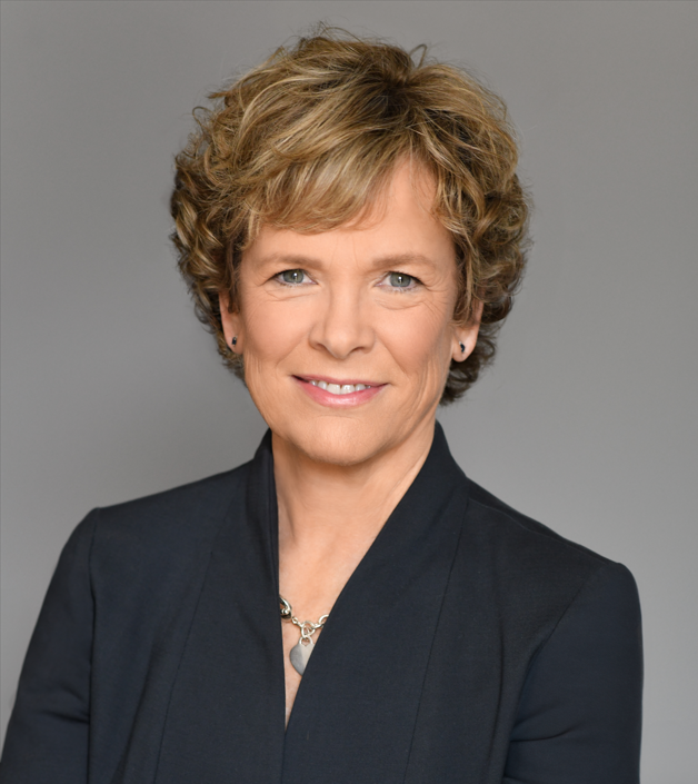 Emily Chapman, MD, smiles in headshot