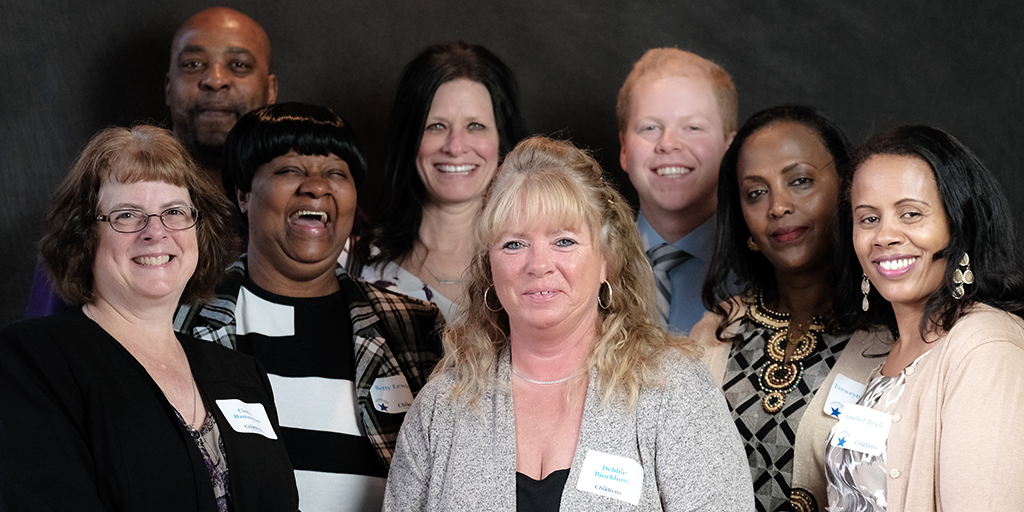 A photo of the EVS team smiling