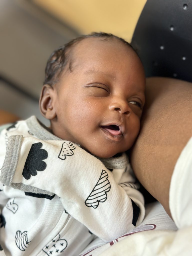 Ezra at home smiling