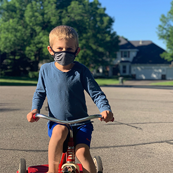 Riding a bike while wearing a face mask