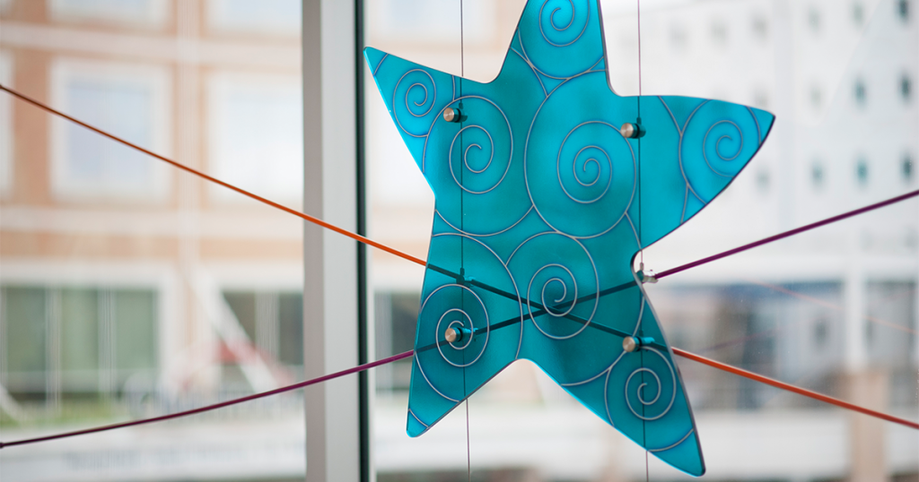 Blue star in Children's Minnesota Minneapolis hospital sky way