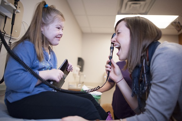 Girl with Down syndrome at appointment