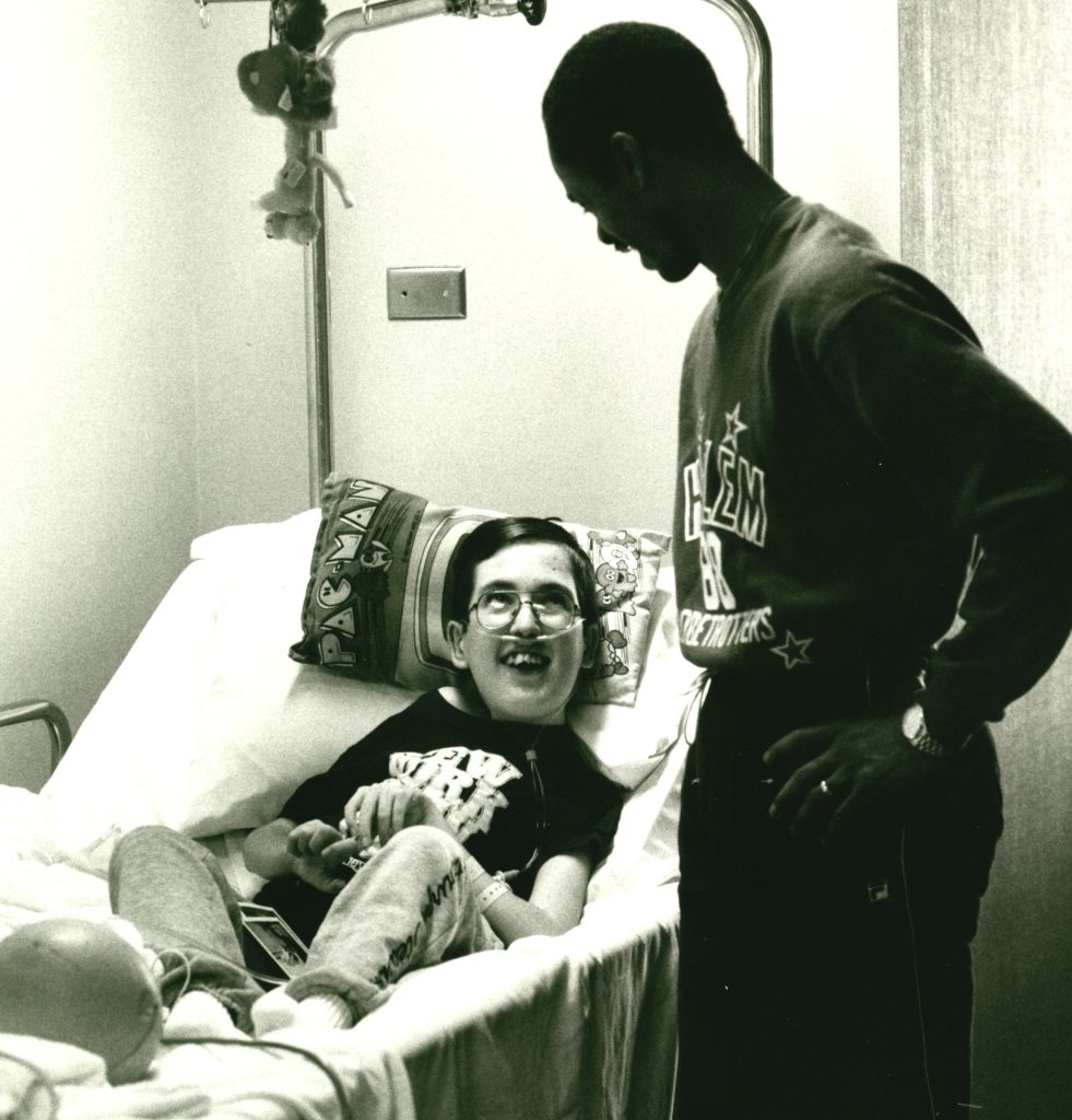 A Harlem Globetrotter visited MCMC patients in 1988.