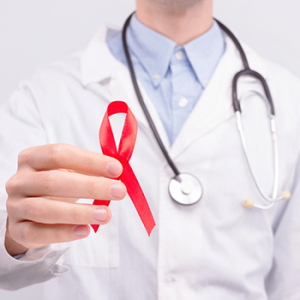 doctor holding HIV testing awareness ribbon