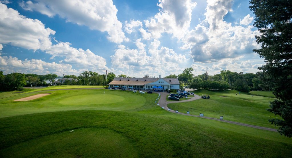 Blue sky and green golf course