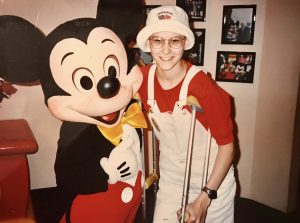Jen and Micky Mouse posing