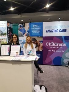 Children's Minnesota experts at our booth at AAP 2022