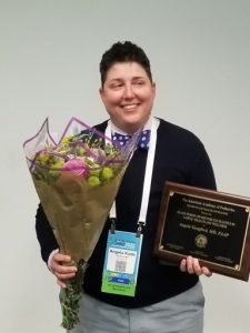 Dr. Angela Kade Goepferd with her award