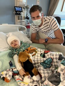 Hudson and his dad at Children's Minnesota