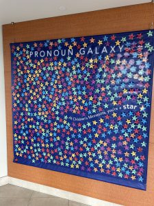 Pronoun galaxy wall hung up at Minneapolis hospital.