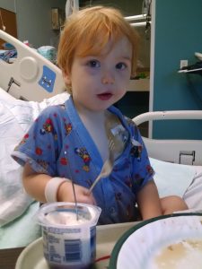 Young Sam in hospital bed