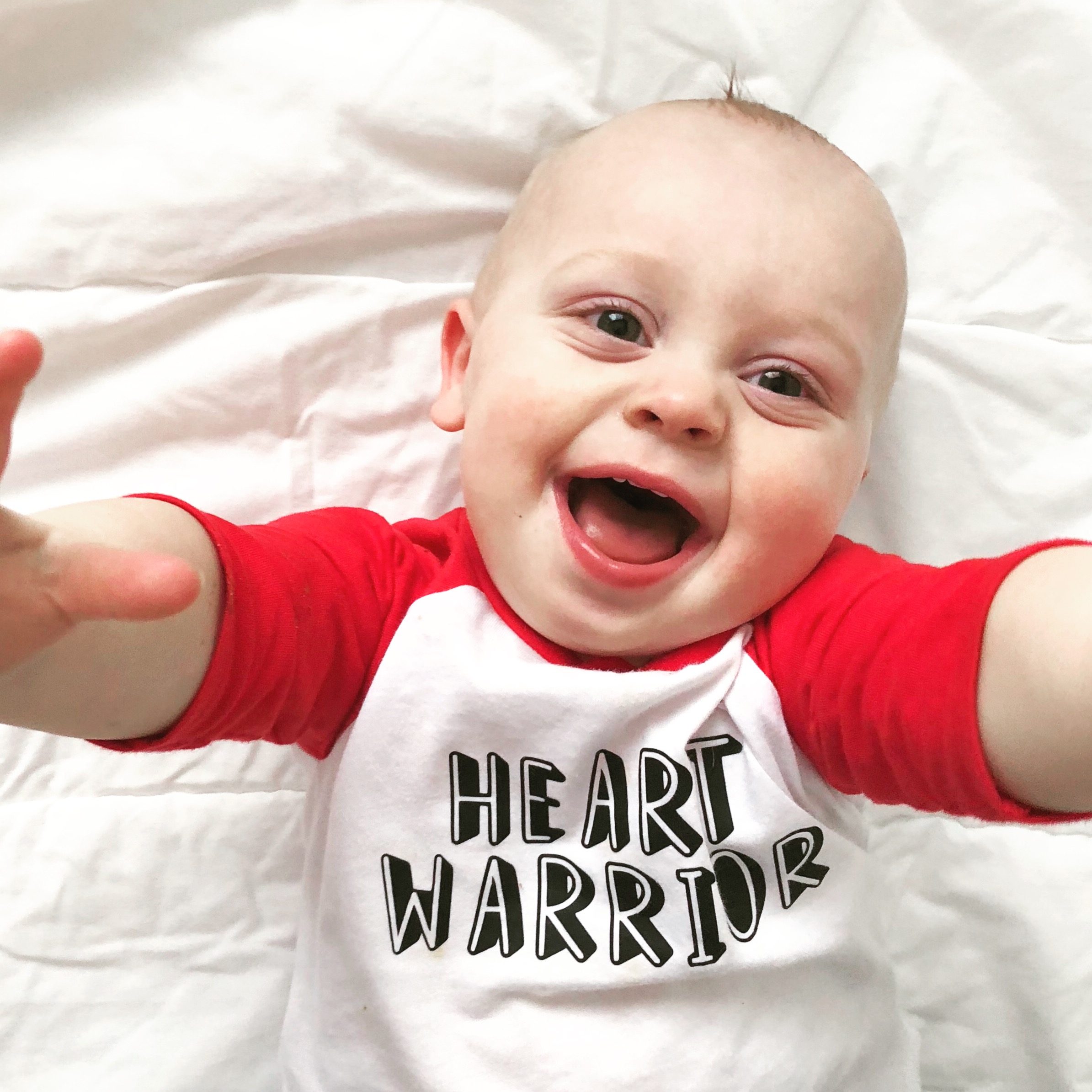 Callen with a heart warrior shirt on