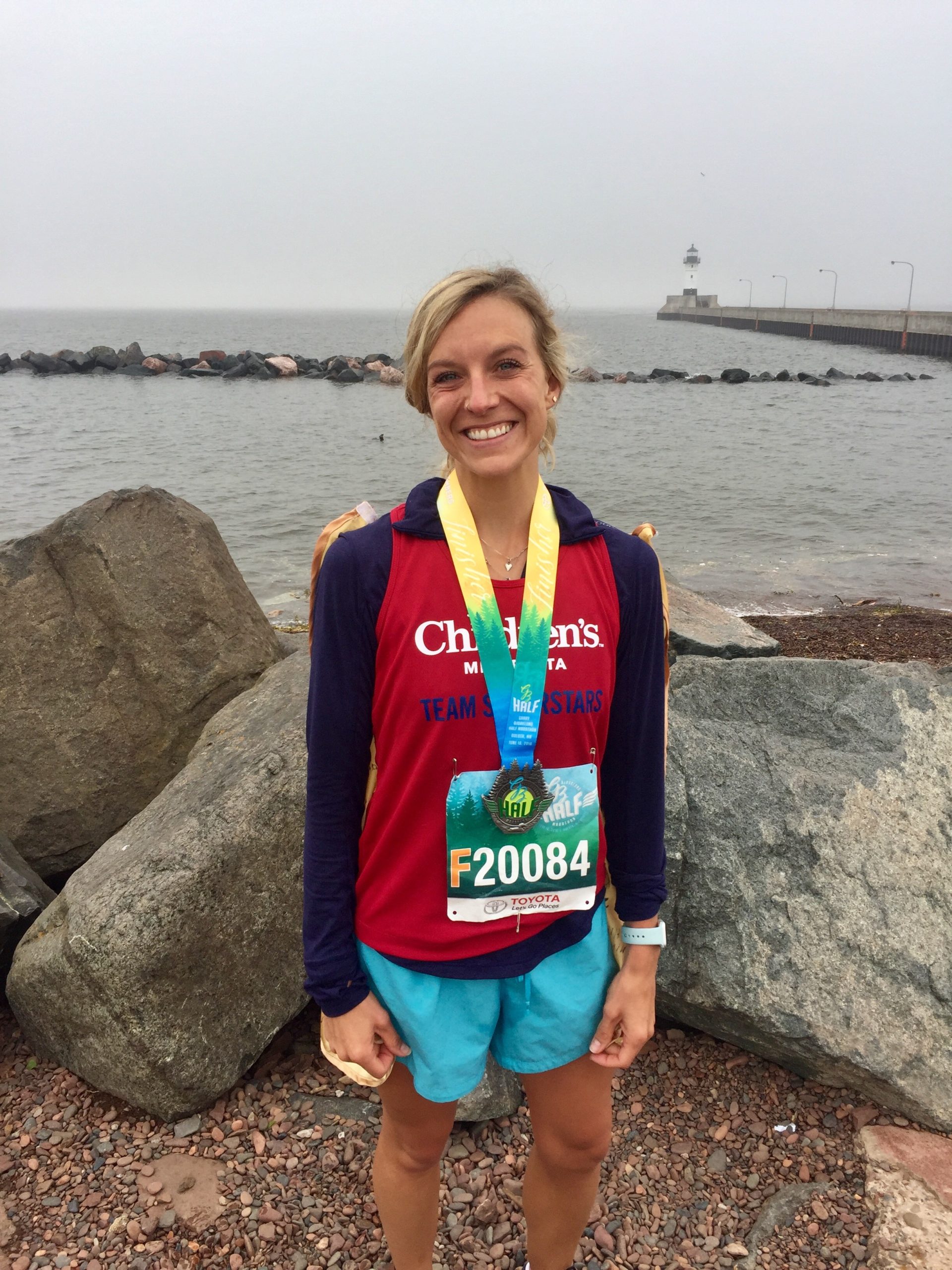 Erin Bevers with a medal after running